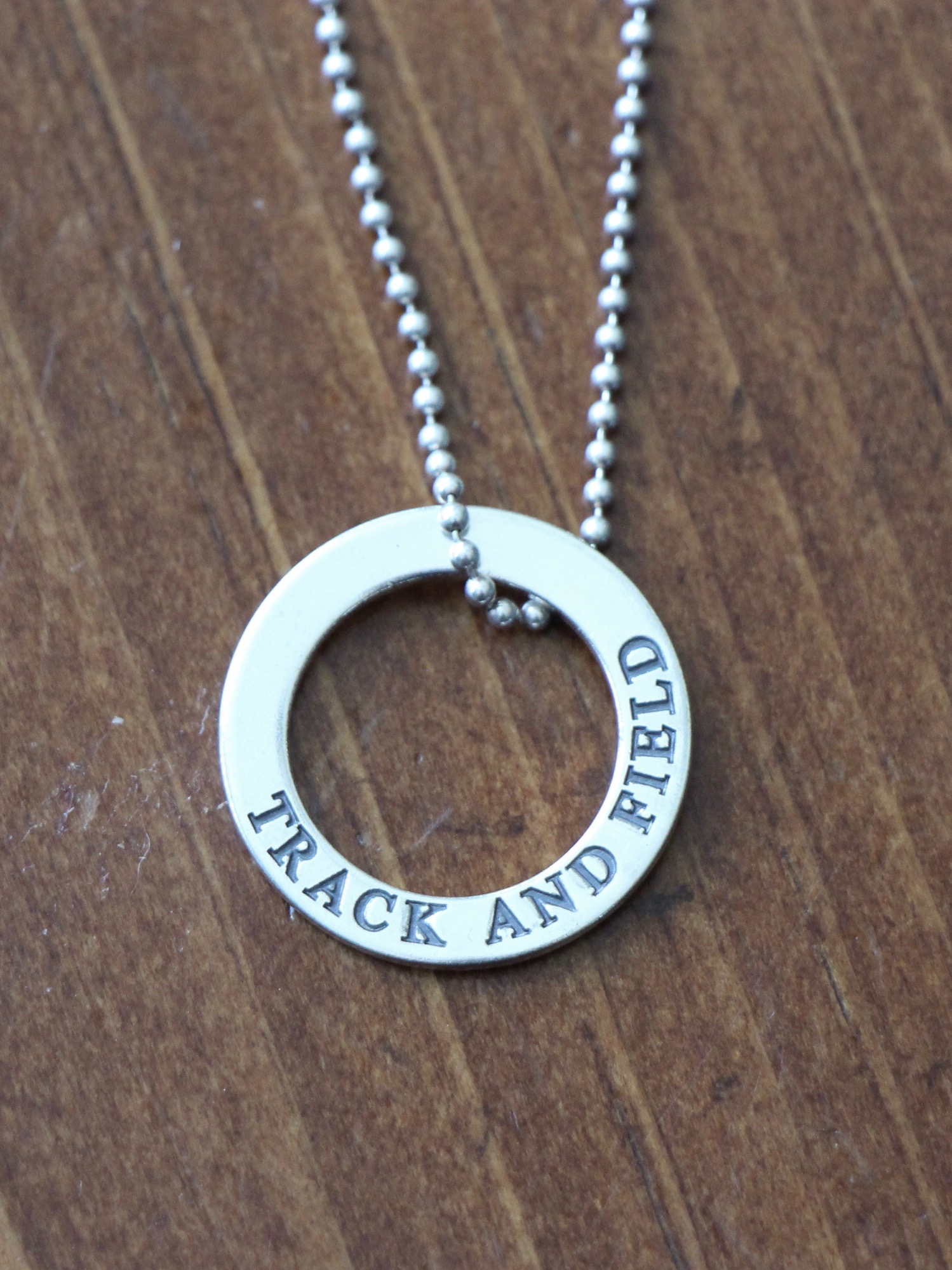 track runner necklace gift kandsimpressions